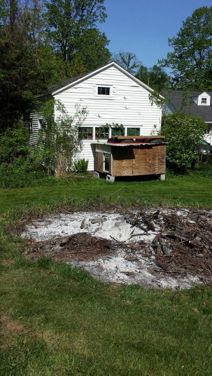 We might have melted the siding on our outbuilding just a bit.