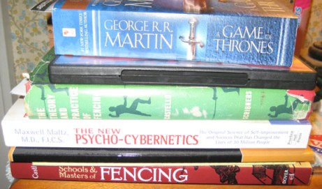 What's sitting by my bed. Well, a few of the books sitting by my bed. 