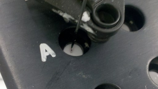 Aiming the sample needle.