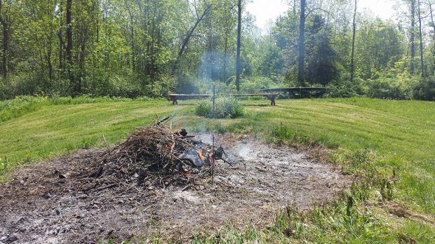 The burn pile the next day. Still going.