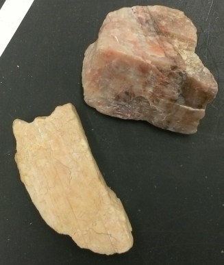 At the light end of the plagioclase scale is the mineral albite. Its rich in the element sodium.