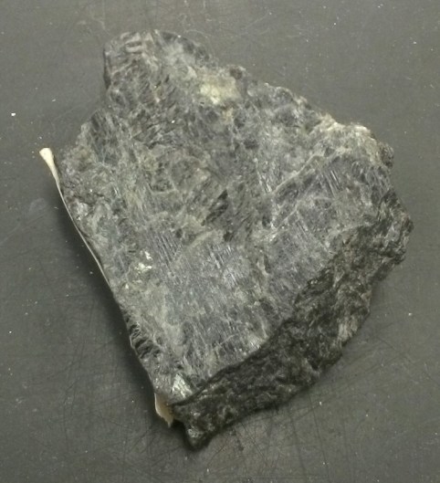 At the dark end of the plagioclase scale is this mineral. It has lots of calcium and little sodium.