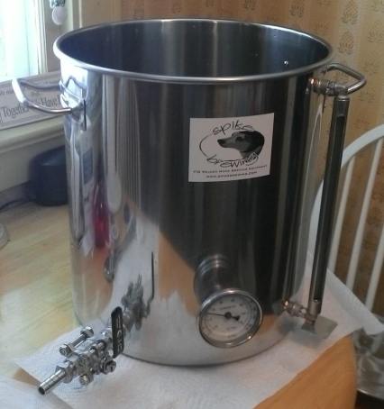 Our new kettle, with ball valve, thermometer, and sight glass. This is what happens when an engineer and a chemist decide to try home-brewing.