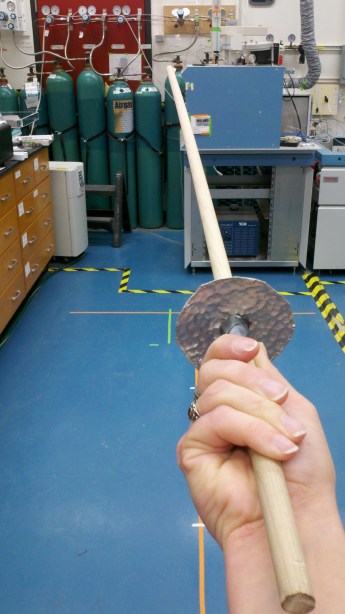 Sword practice in the laboratory. Fencing is serious business, but a dowel makes a good practice foil.