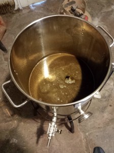 After steeping the grains, it was time to add the malt extracts, honey, and hops and let the wort boil.