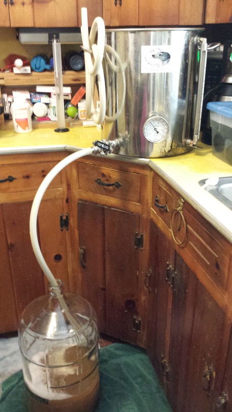 Wort flowing from kettle to carboy.